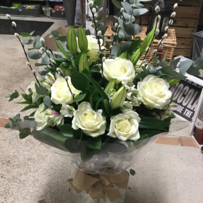Ivory Tower - Gorgeous floral tower of ivory roses with fabulous complimentary foliage sure to wow anyone for their special occasion